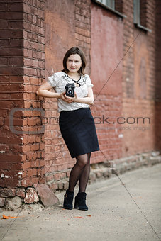 Girl with vintage camera