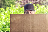 Man delivering a large cardboard box
