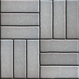 Gray Paving Slabs of Rectangles Laid Out on Three Pieces Perpendicular to Each Other.