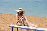 summer sweet girl sitting in beach