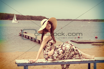vintage color effect summer shot of girl on the beach