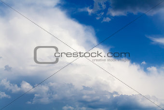 Blue sky with rainy clouds