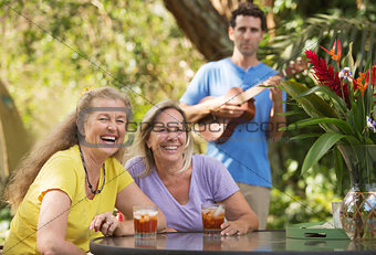 Laughing Women with Ukelele Player
