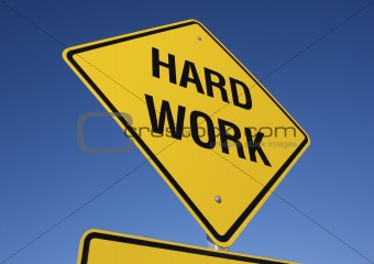 Hard Work road sign.