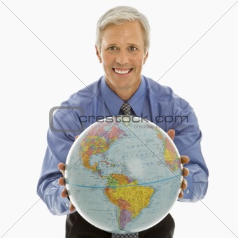 Man gesturing with globe.