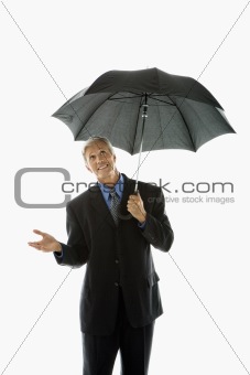 holding umbrella