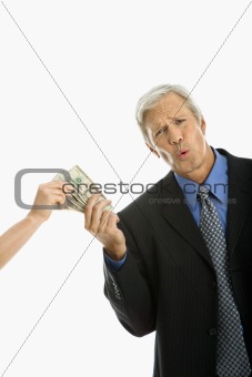People holding money.