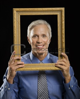 Man in picture frame.