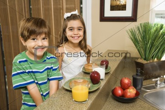 Kids eating breakfast.