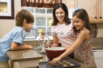 Family making cookies.