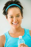 Smiling young fitness woman