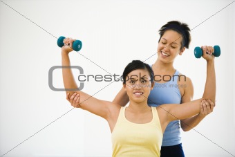Woman and fitness instructor
