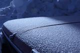 The car covered with frost.