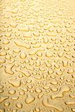 water droplets gold background