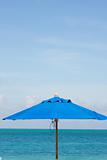 blue sea sky and umbrella