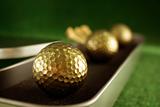 Golden golfballs in gift set