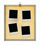 corkboard with four photo frames