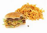 half-eaten hamburger and french fries