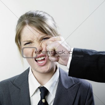 Punched businesswoman