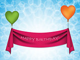Happy birthday ribbon on heart balloons