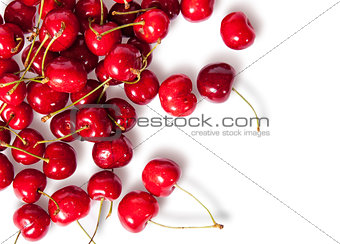 Pours pile of juicy sweet cherries