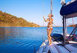 Sexy woman on sailboat