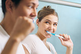 Couple Cleans Teeth Man And Woman Together In Bathroom