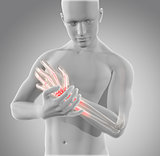 3D male figure holding wrist in pain