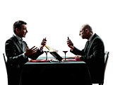 business using smartphones dinner silhouettes
