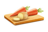 Organic vegetables carrots potatoes cut on wooden board