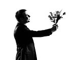 silhouette one man holding offering  flowers bouquet