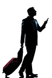 silhouette man walking on the phone full length