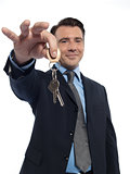 Man Businessman realtor teasing holding offering keys