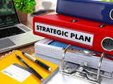 Red Ring Binder with Inscription Strategic Plan.