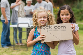 Happy children  holding blank