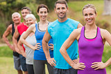 Happy athletic group smiling at camera