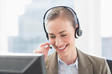 Smiling businesswoman with headset