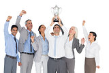Business people holding cup and cheering