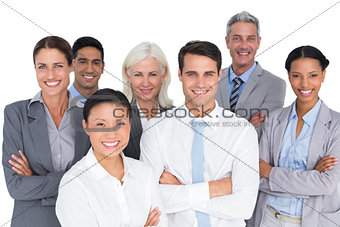 Business people looking at camera with arms crossed