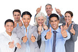 Happy business people with thumbs up looking at camera