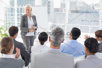 Businesswoman doing speech during meeting