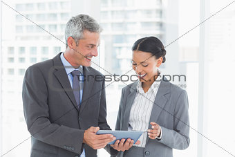 Business people using tablet computer