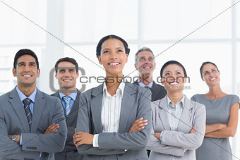 Business people looking up in office