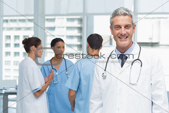 Portrait of a smiling confident male doctor