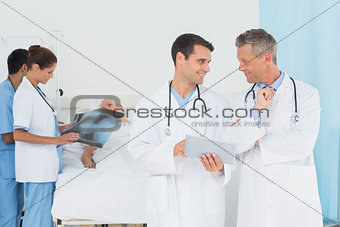 Report reading with patient behind