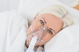 a patient with an oxygen mask