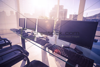 composite image of computer in front of window