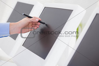 Businessman pointing his screen