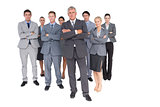 Business team standing arms crossed