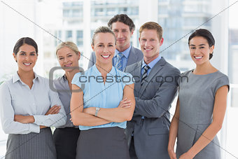 Business team smiling at camera